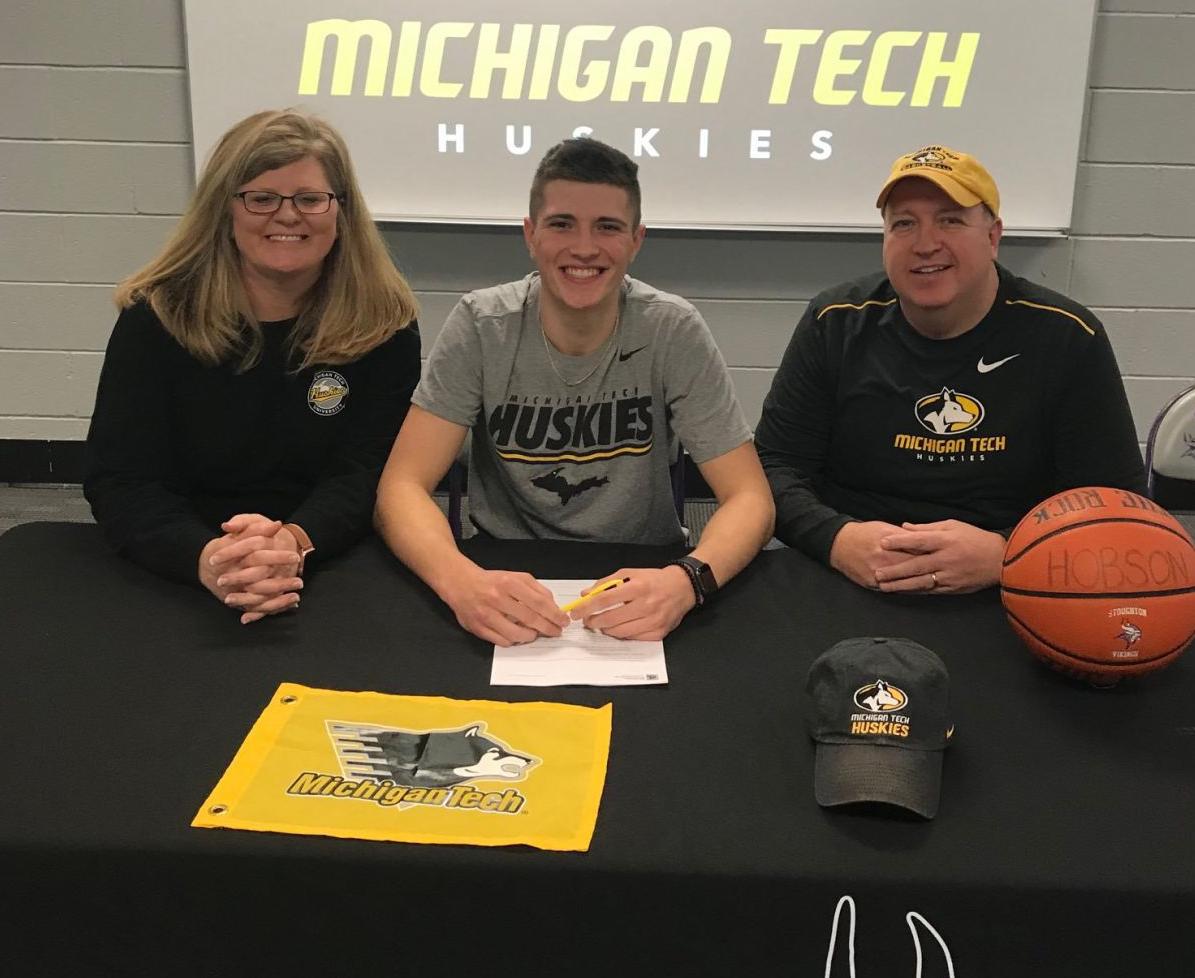 National Signing Day photo: Stoughton basketball player Adam Hobson with Michigan Tech